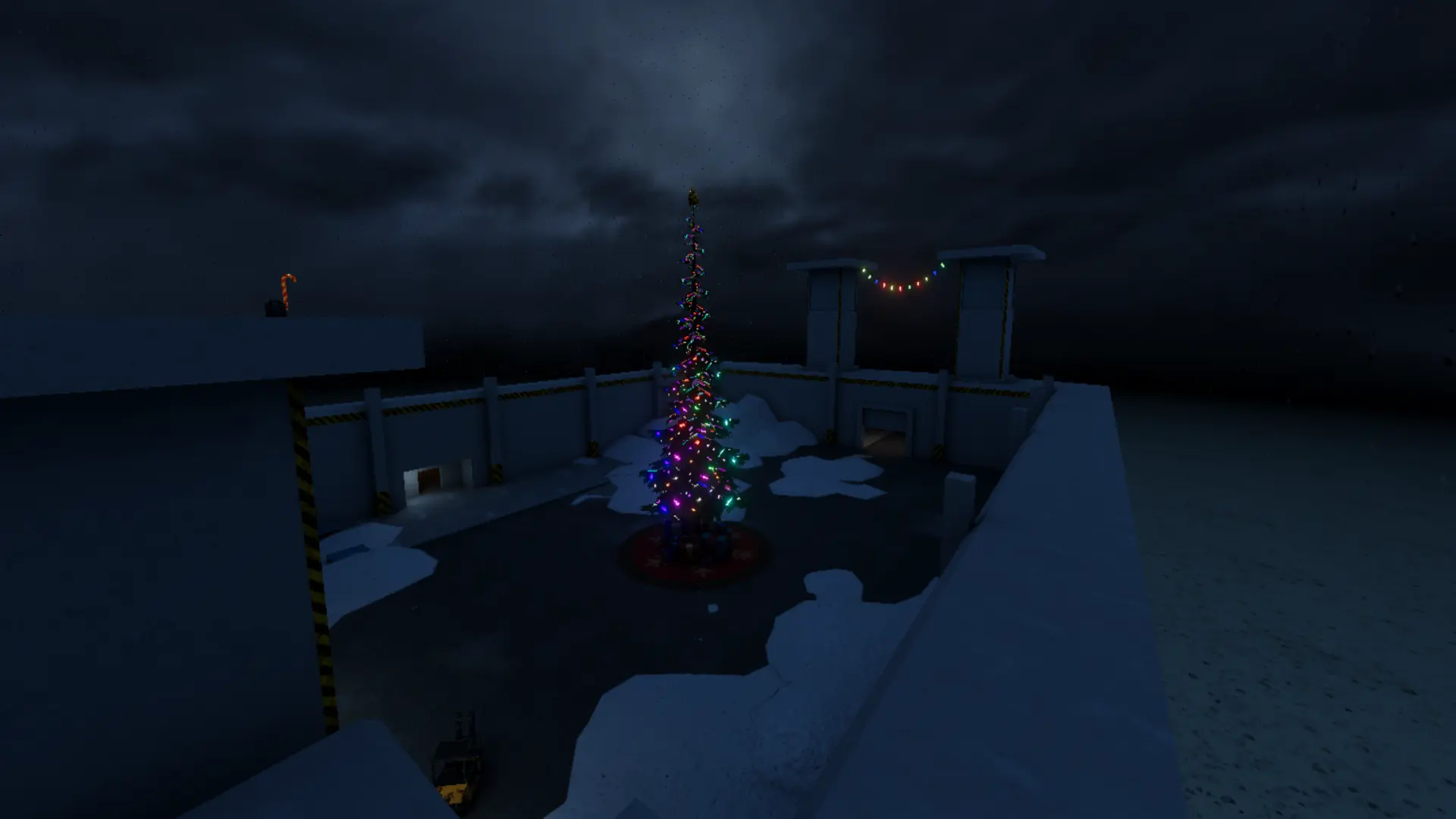 The snowed-in rooftop at night with a lit tree